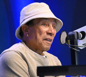 Smokey Robinson speaking at an event before responding to sexual assault allegations filed in a 2025 civil lawsuit.