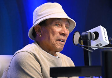Smokey Robinson speaking at an event before responding to sexual assault allegations filed in a 2025 civil lawsuit.
