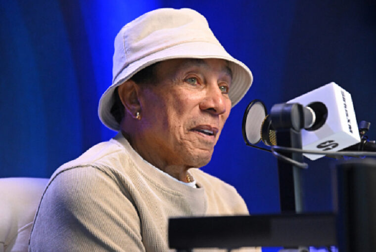 Smokey Robinson speaking at an event before responding to sexual assault allegations filed in a 2025 civil lawsuit.